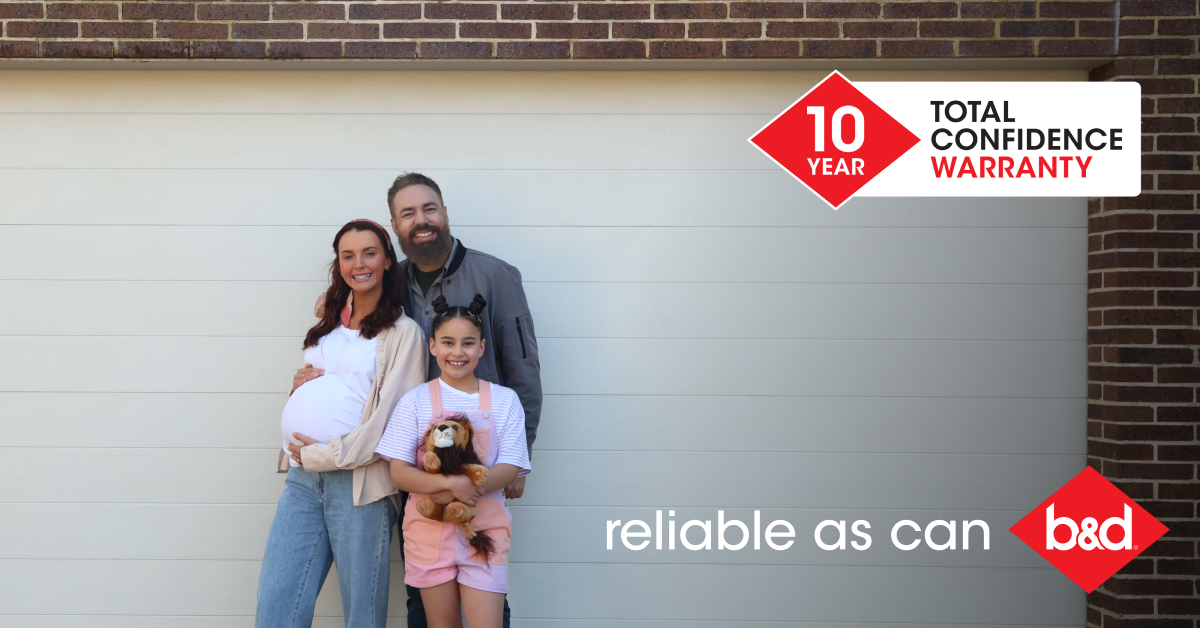 Reliable as Can B&D family with expecting mother standing in front of garage door