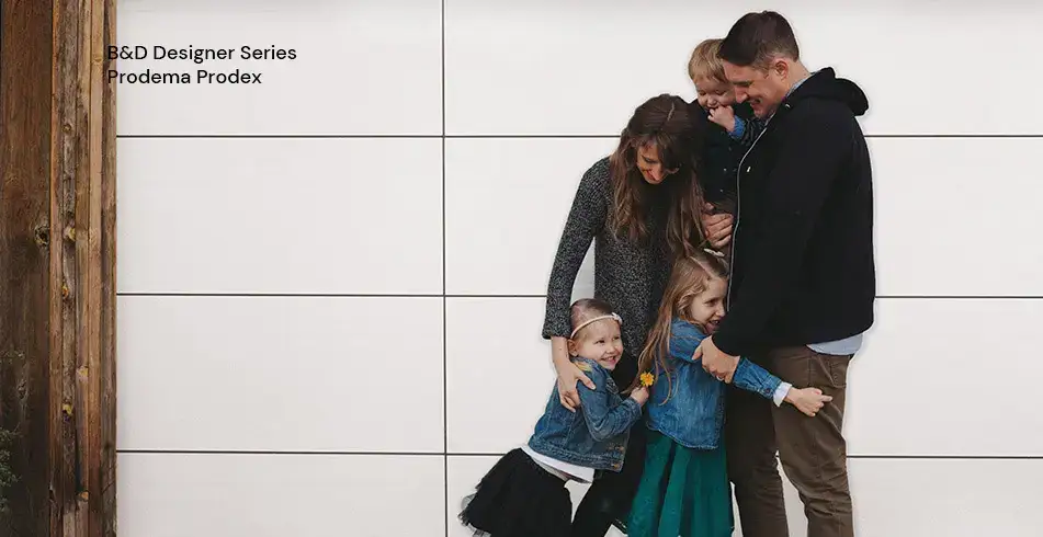 Safe as Can B&D Family Embracing in front of Prodema Prodex Garage Door